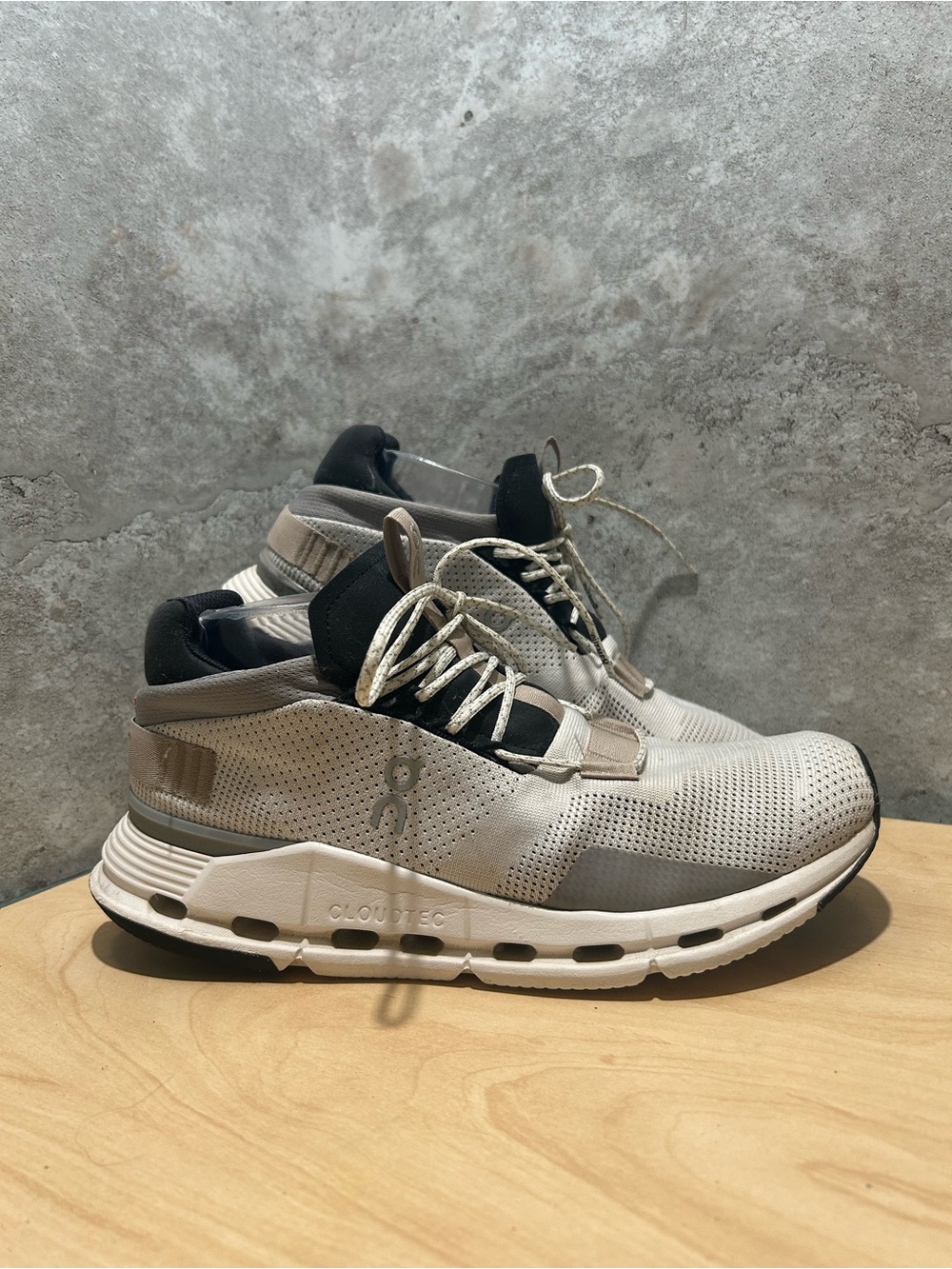 On Cloudnova in the White/Sand colorway women’s size 9.5